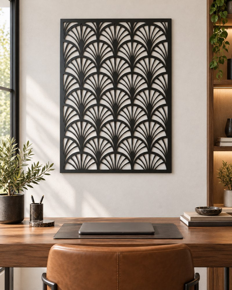 Art Deco black metal wall panel above a workplace desk